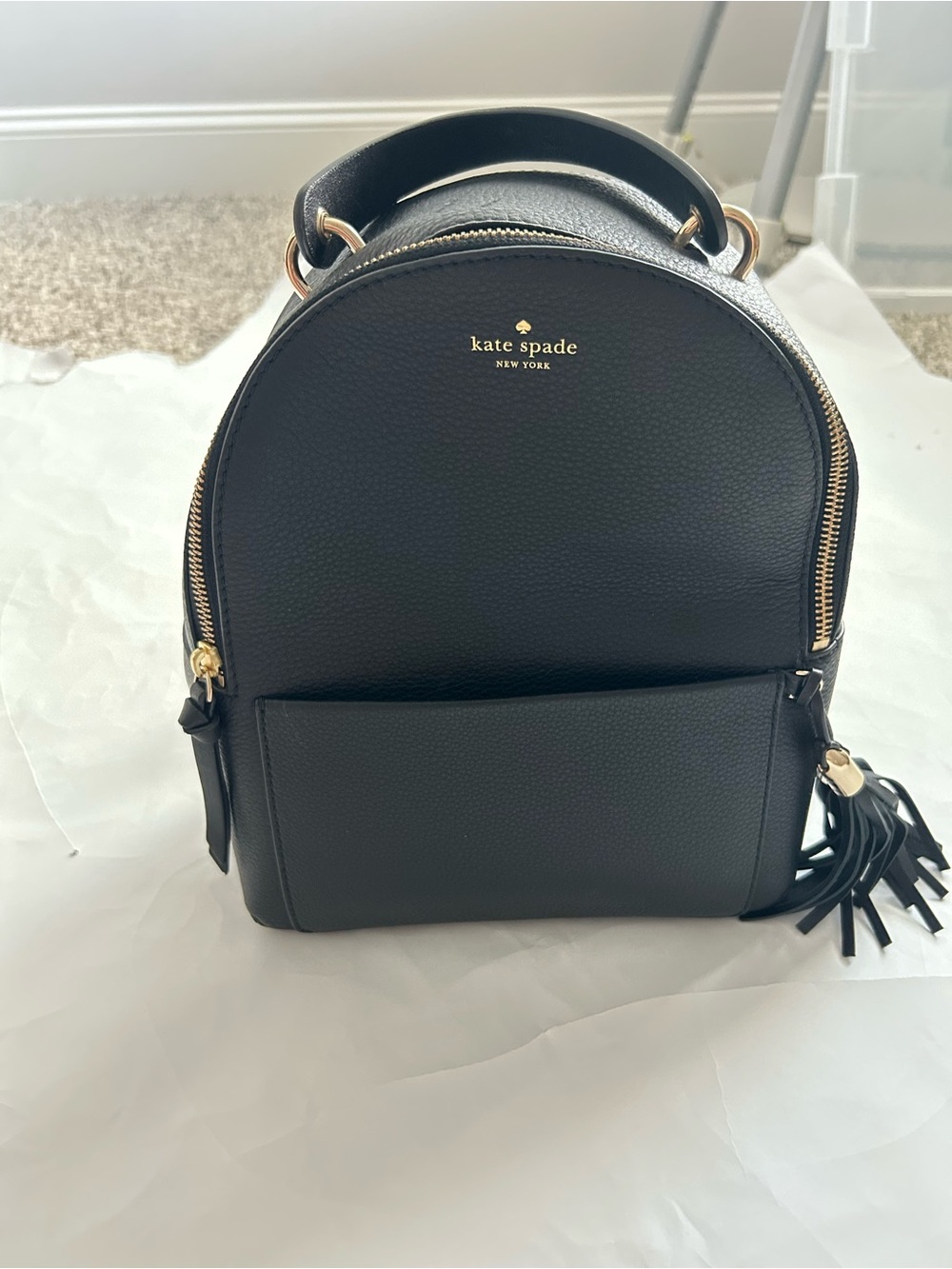 kate spade Black Pebbled Leather Mini Backpack with Tassel